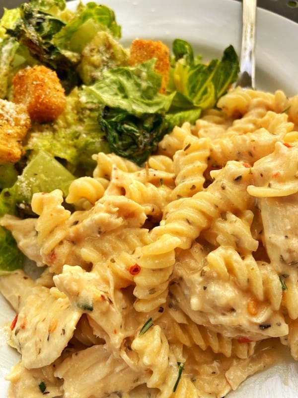 Crock Pot Garlic Parmesan Chicken Pasta with a side salad