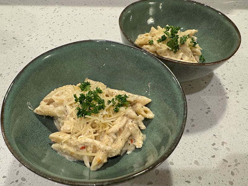 Garlic Parmesan Chicken Pasta served in bowls with Penne Pasta