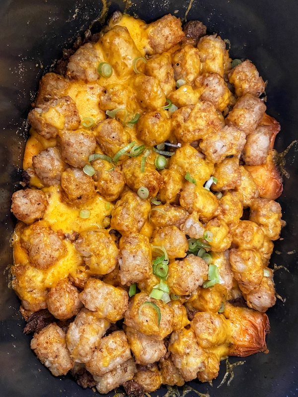 https://www.crockpotsandflipflops.com/wp-content/uploads/2021/02/Slow-Cooker-Mexican-Tater-Tot-Casserole-Finished-Crock.jpg