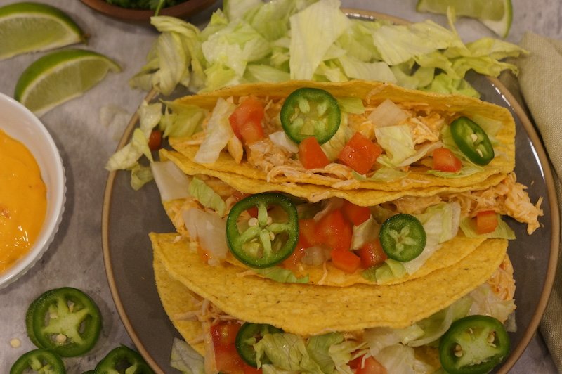 Slow Cooker Queso Chicken Tacos