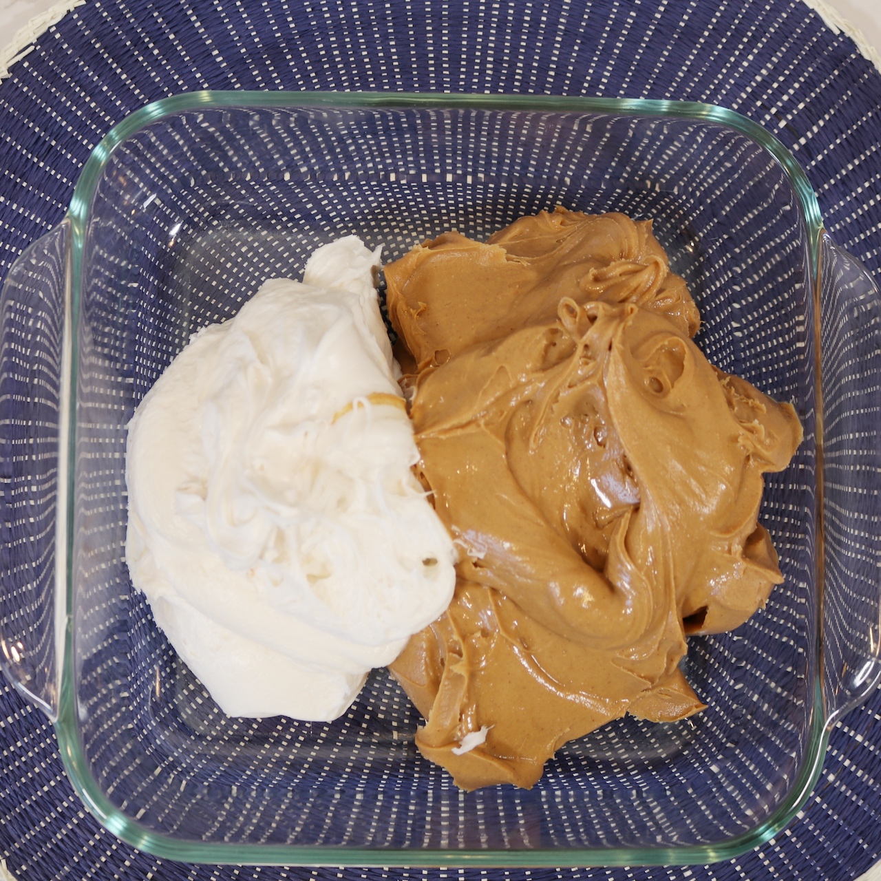 Peanut butter and frosting in glass dish