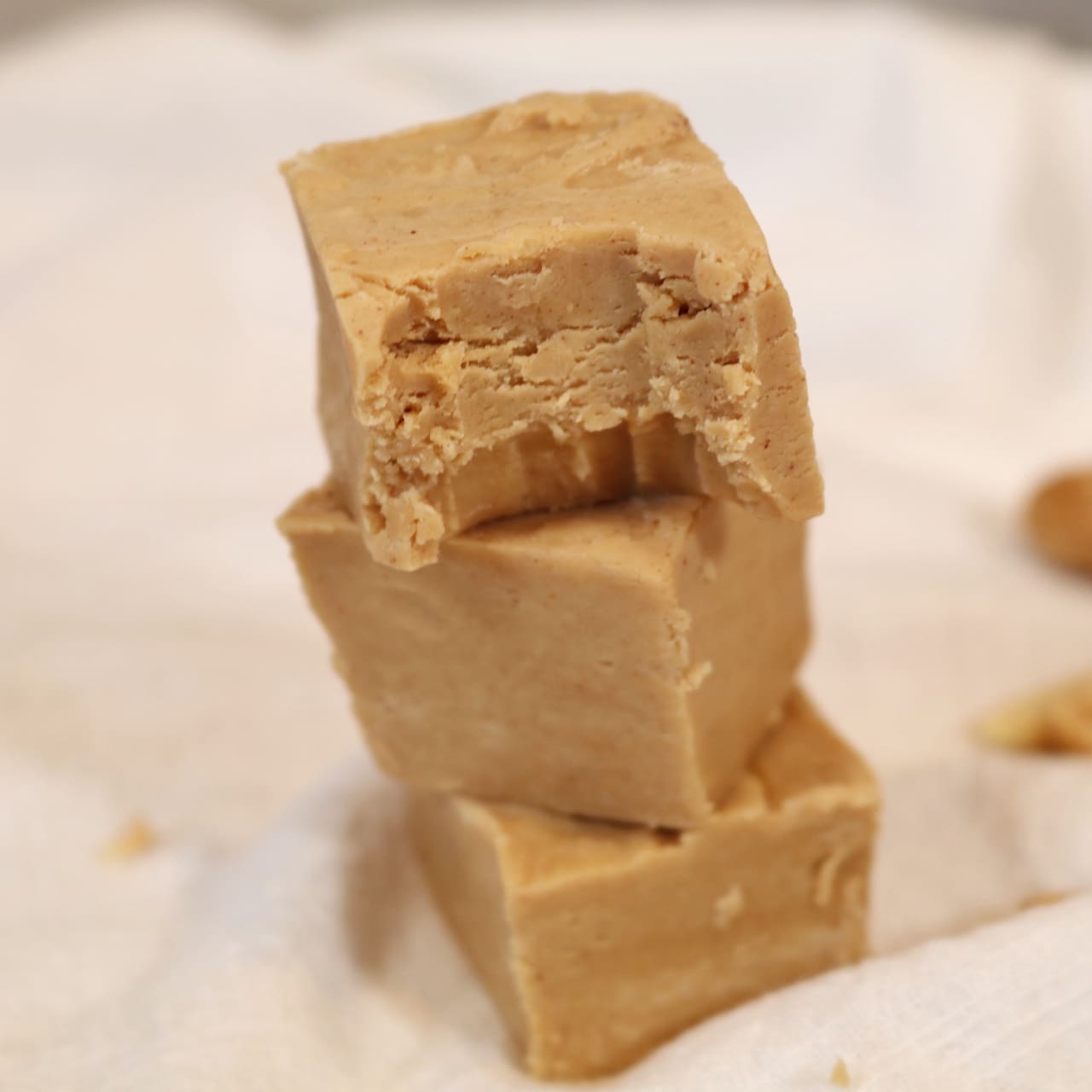 2 Ingredient Peanut Butter Fudge with bite in top fudge