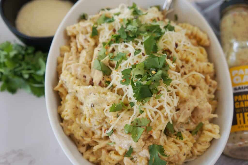 Garlic parmesan chicken and pasta served in a bowl