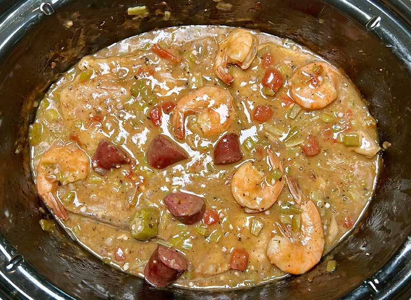 Flip the pork chops and add the shrimp