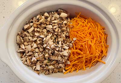 Add the mushrooms and shredded carrots